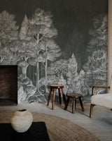 Room interior with a forest mural on the wall, wooden stool, and vase.