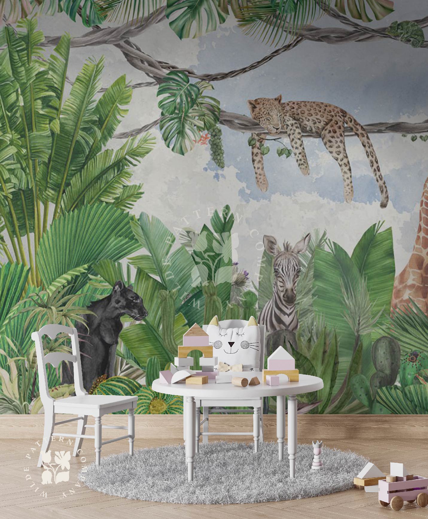 Children's play area with jungle-themed wall mural featuring animals and plants.