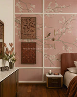 Bedroom with floral wall design and 'Wilde Pattern Company' branding.