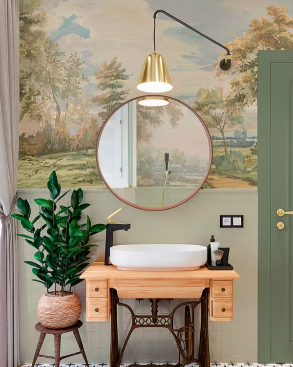 Bathroom with round mirror, sink, and decorative wall mural
