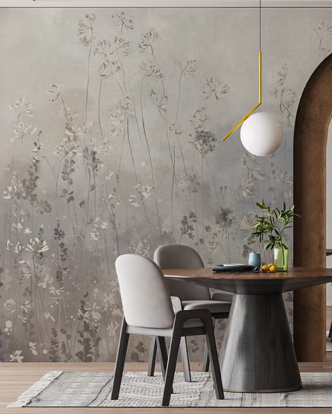 Dining room with floral wallpaper, wooden table, and chairs.